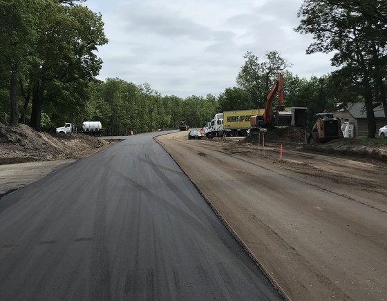 Crews pave on Hwy 200 near Roy Lake