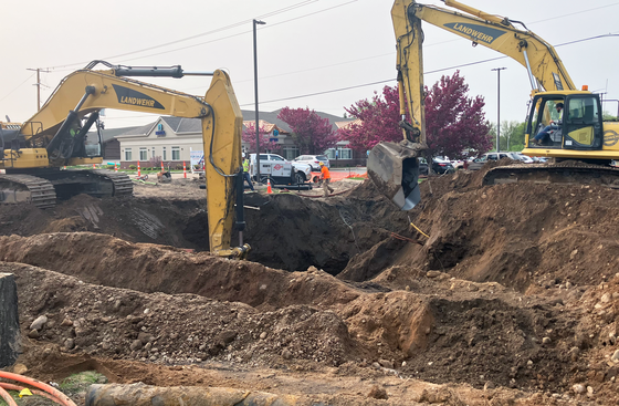 Install utilities beneath the road