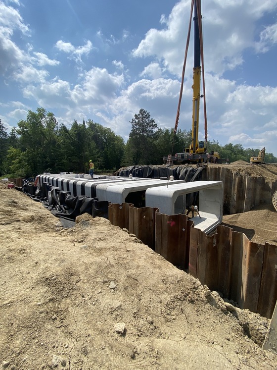Crews build the box culvert at the Shell River on Highway 34