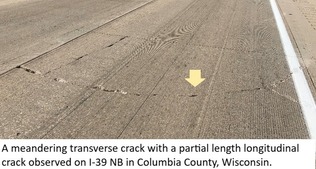 A meandering transverse crack with a partial length longitudinal crack observed on I-39 NB in Columbia County, Wisconsin.