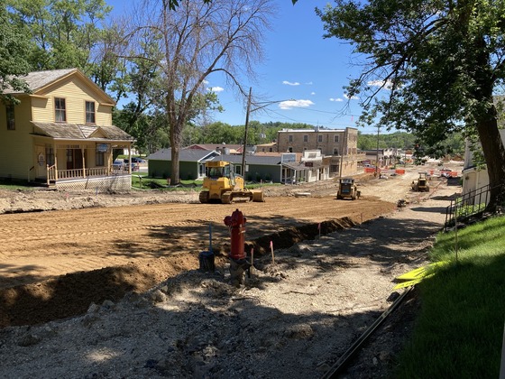 Photo of Highway 57 looking south from Sixth Street in Mantorville at construction equipment.