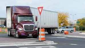 large truck making turn on roundaabout