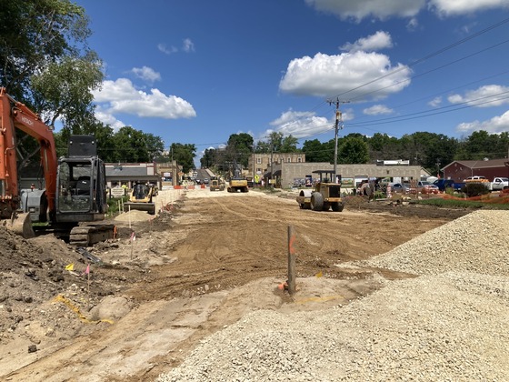 Photo of construction equipment on Highway 57 in Mantorville with unpaved road.