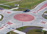 Vehicle enters mini-roundabout