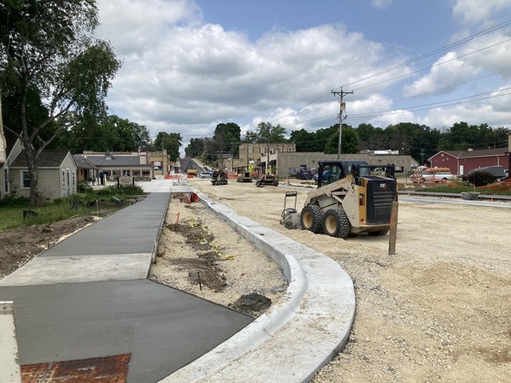 Photo showing construction zone on Highway 57 in Mantorville with new concrete sidewalks between Fifth and Fourth streets.