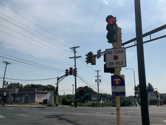 Stoplight with no-turn-on-red sign attached to pole