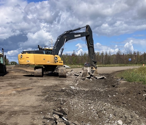 Image of machine removing concrete