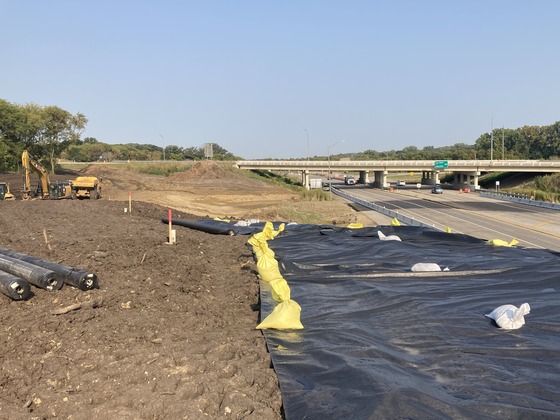 Photo showing construction site next to Highway 52 at Interstate 90 that will be the location of a flyover ramp.