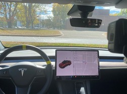 Tesla interior with autopilot system