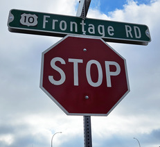 frontage road sign