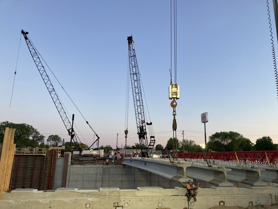 Bridge beam is set for Fourth Street Northwest in Austin over Interstate 90.