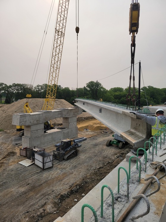 Highway 52 flyover bridge beam setting.