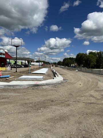 Sidewalks are poured on Hwy 59