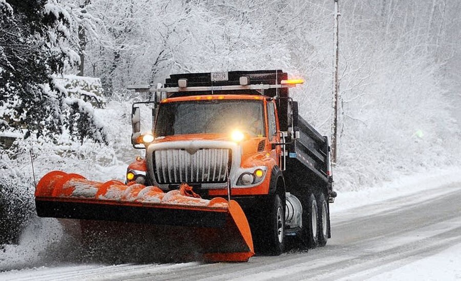 Plow truck in snow