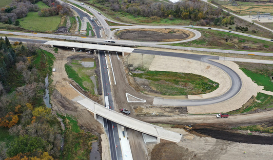 Aerial photo looking north on Highway 52 toward Interstate 90 showing the flyover ramp path that will be completed in 2026.