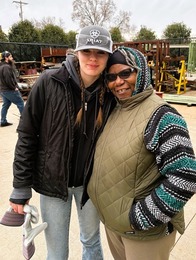 Miller with a participant in Building Strong Communities