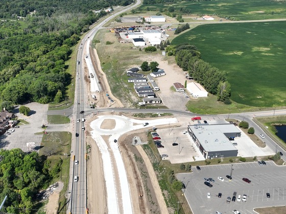 Aerial photo of Highway 210 west of the bridge looking west