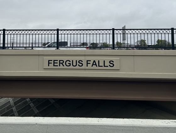 Painted bridge with black text Fergus Falls