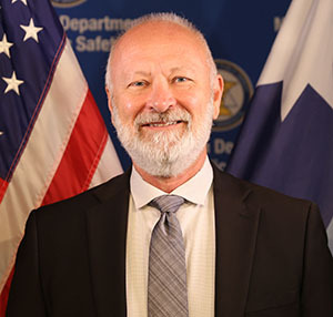 Commissioner Bob Jacobson smiling