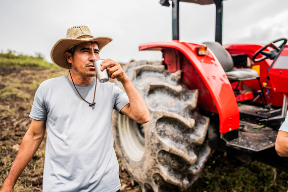 Worker outdoors drinking water