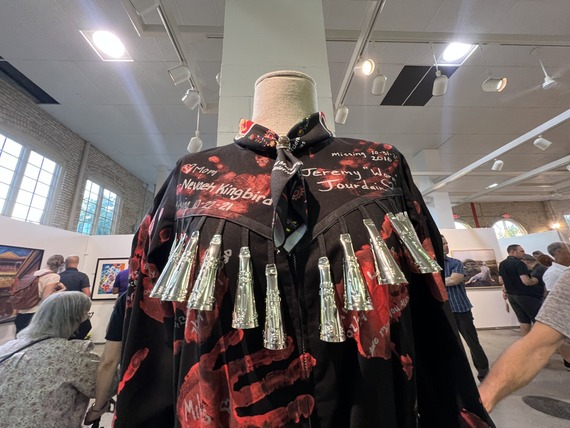 Black jingle dress with red handprints