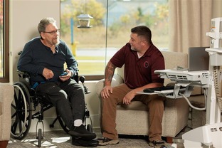 Bemidji Resident with Staff