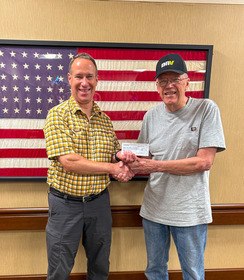MVH - Fergus Falls Public Affairs Coordinator Gary Harris accepting a donation from DAV Fergus Falls Chapter 25