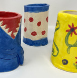 Clay mugs/cups painted in different colors and themes