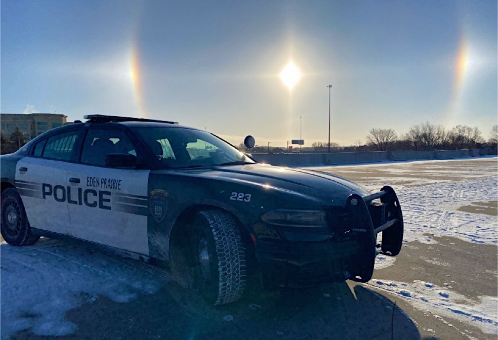 EPPD squad car with a sun dog in the background