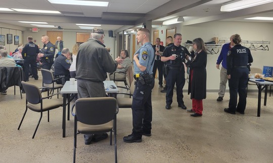 An EPPD officer chats with attendees