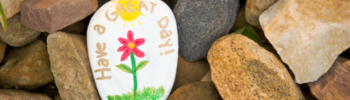 Rock with "Have a Great Day" painted on it