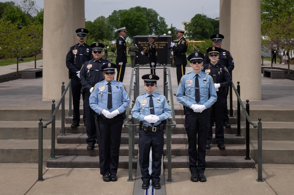 Officers standing guard at the Minnesota Law Enforcement Memorial on state capitol grounds