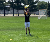 Kid catching a frisbee