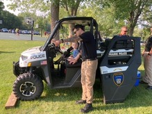Kids looking at EPPD equipment