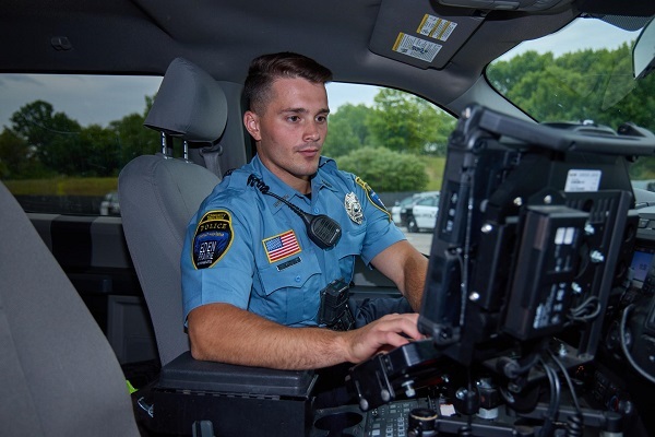 police cadet in EPPD squad vehicle