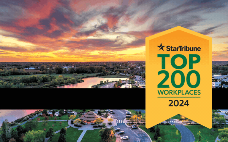 Top Workplace ... 11th year in a row. Background shows aerial view of Purgatory Creek Park at sunset.