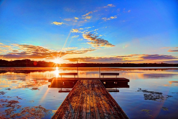 dock overlooking lake and sunset in Eden Prairie