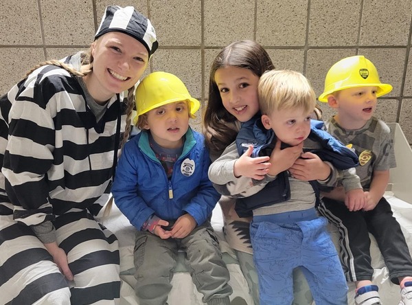Kids pose for a photo in the EPPD jail