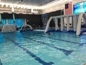 Inflatable obstacle course in dive pool