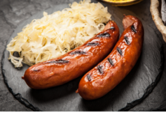 Brats and sauerkraut on a plate