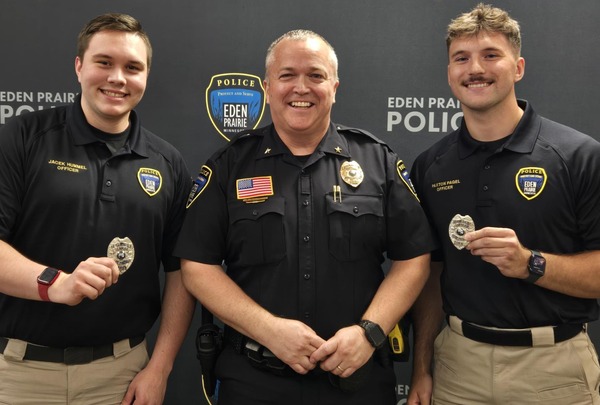 Officer Jacek Hummel, Chief Matt Sackett, Officer Paxton Pagel