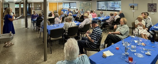 Senior Center manager Sue Bohnsack thanks room of volunteers.