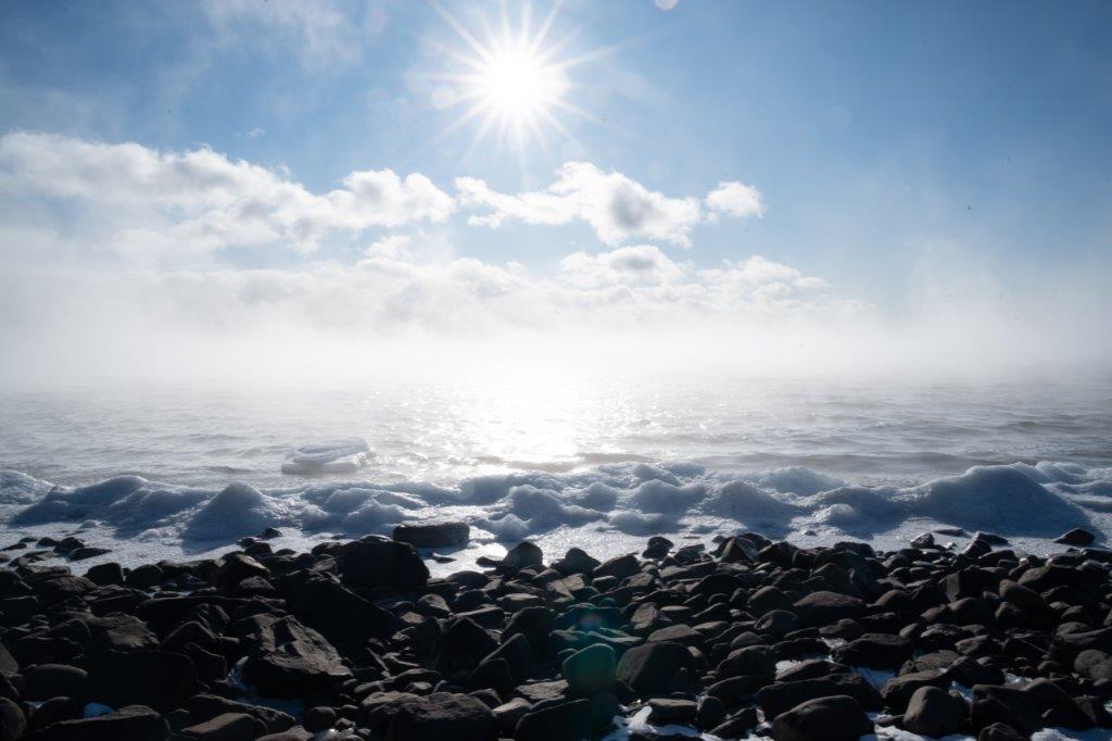North Shore Minnesota during sea smoke on a polar vortex, winter Lake Superior