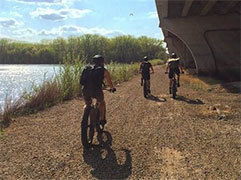 Three riders explore the Minnesota River Bottoms