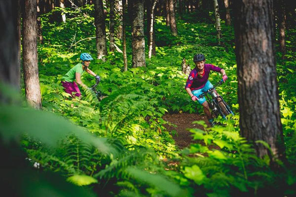 Two riders on the Duluth Traverse trail