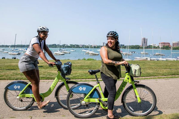 Riders take a break on the Grand Rounds Scenic Bikeway