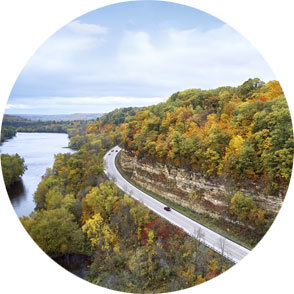 Fall drive on scenic highway next to river