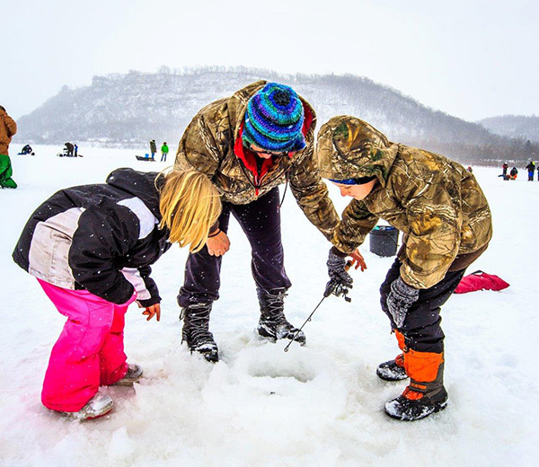 image of Ice fishing during last year's Sportsman's Fishing Contest in Lake City