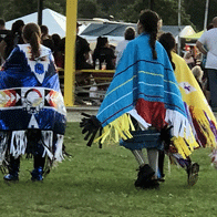 an image of Native Americans in regalia