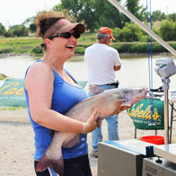 an image of a woman with a catfish